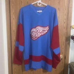 MENS XL STARTER HOCKEY JERSEY.
